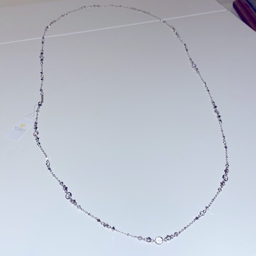 Layered Kendra Scott silver necklace with various jewels. New with tag.